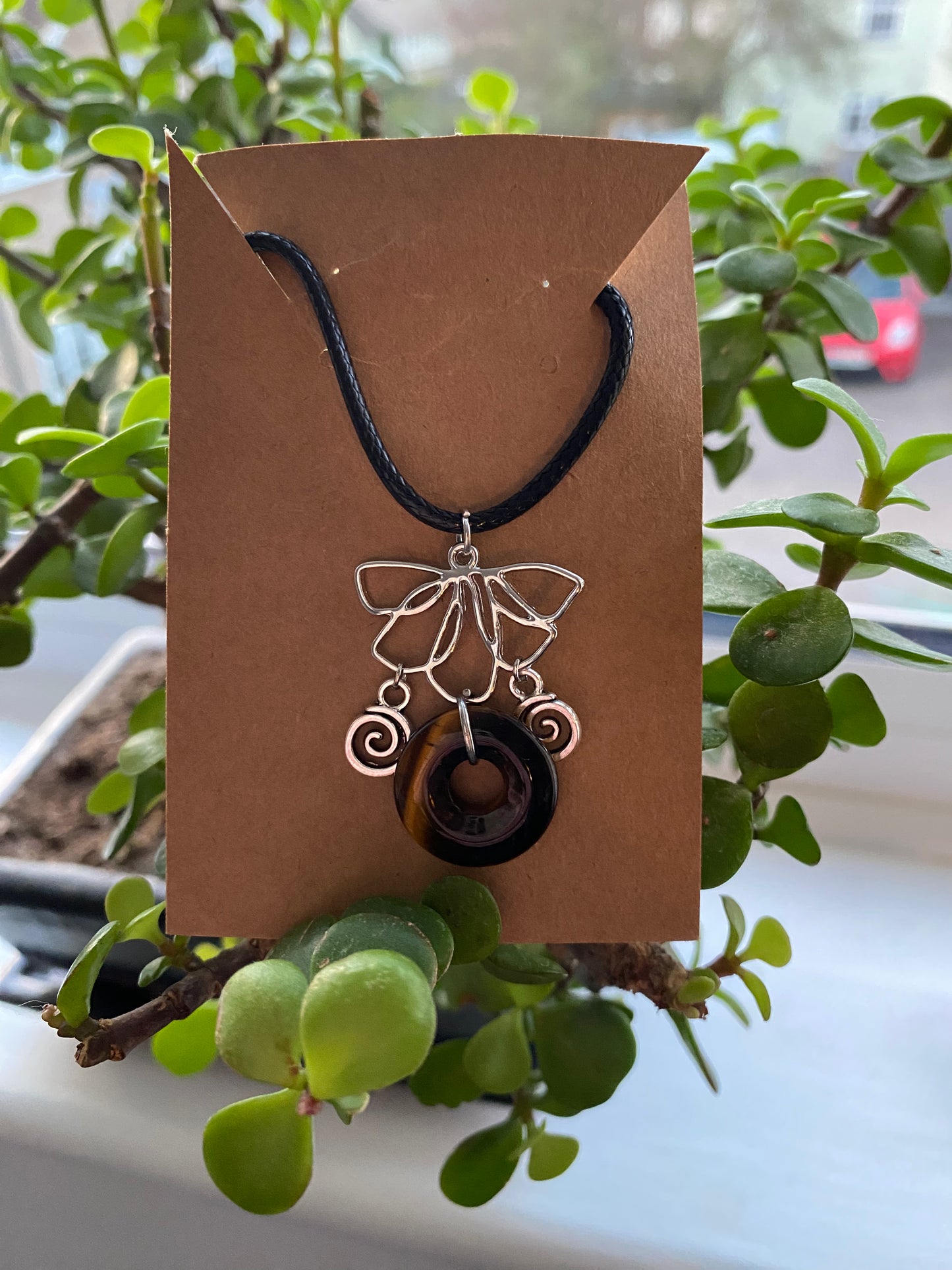 Crystal Lotus Swirl necklaces