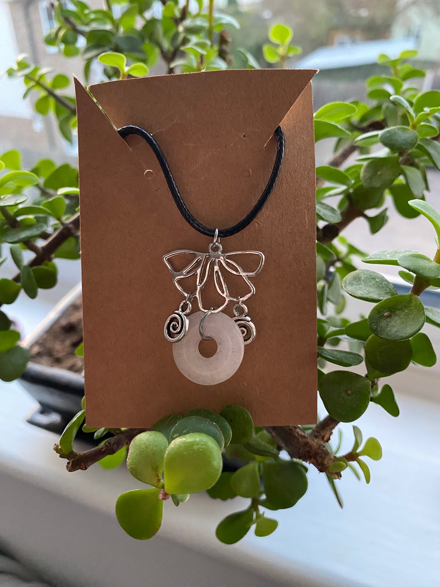 Crystal Lotus Swirl necklaces