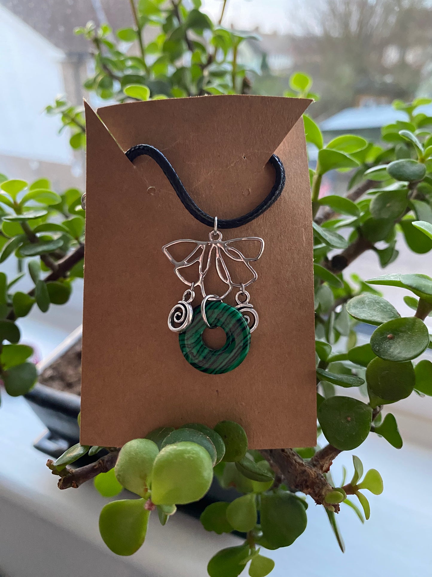 Crystal Lotus Swirl necklaces